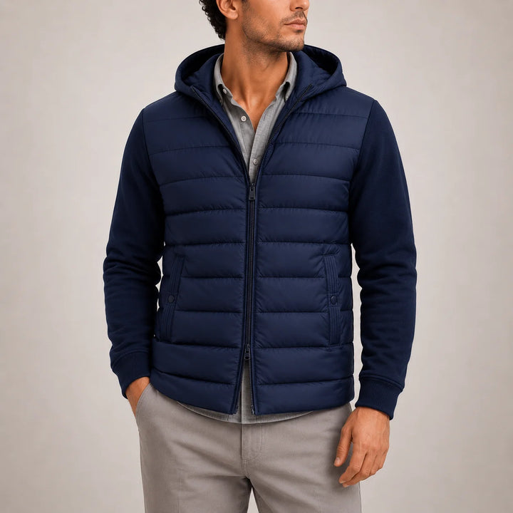 Detail of men's puffer jacket showing horizontal channel quilting and ribbed cuffs