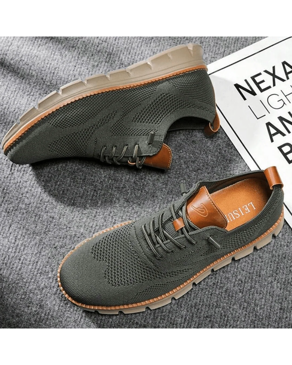 Overhead view of men's knit trainers highlighting lace-up design and rounded toe shape.