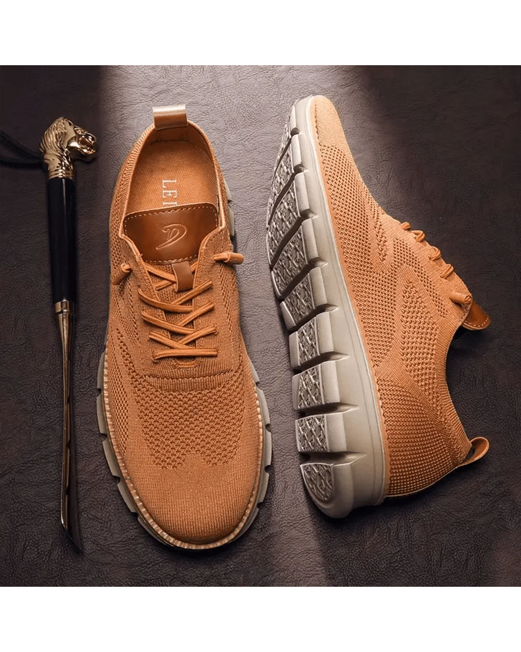 Men's knit trainers in olive displayed from front angle with lace-up detail visible.