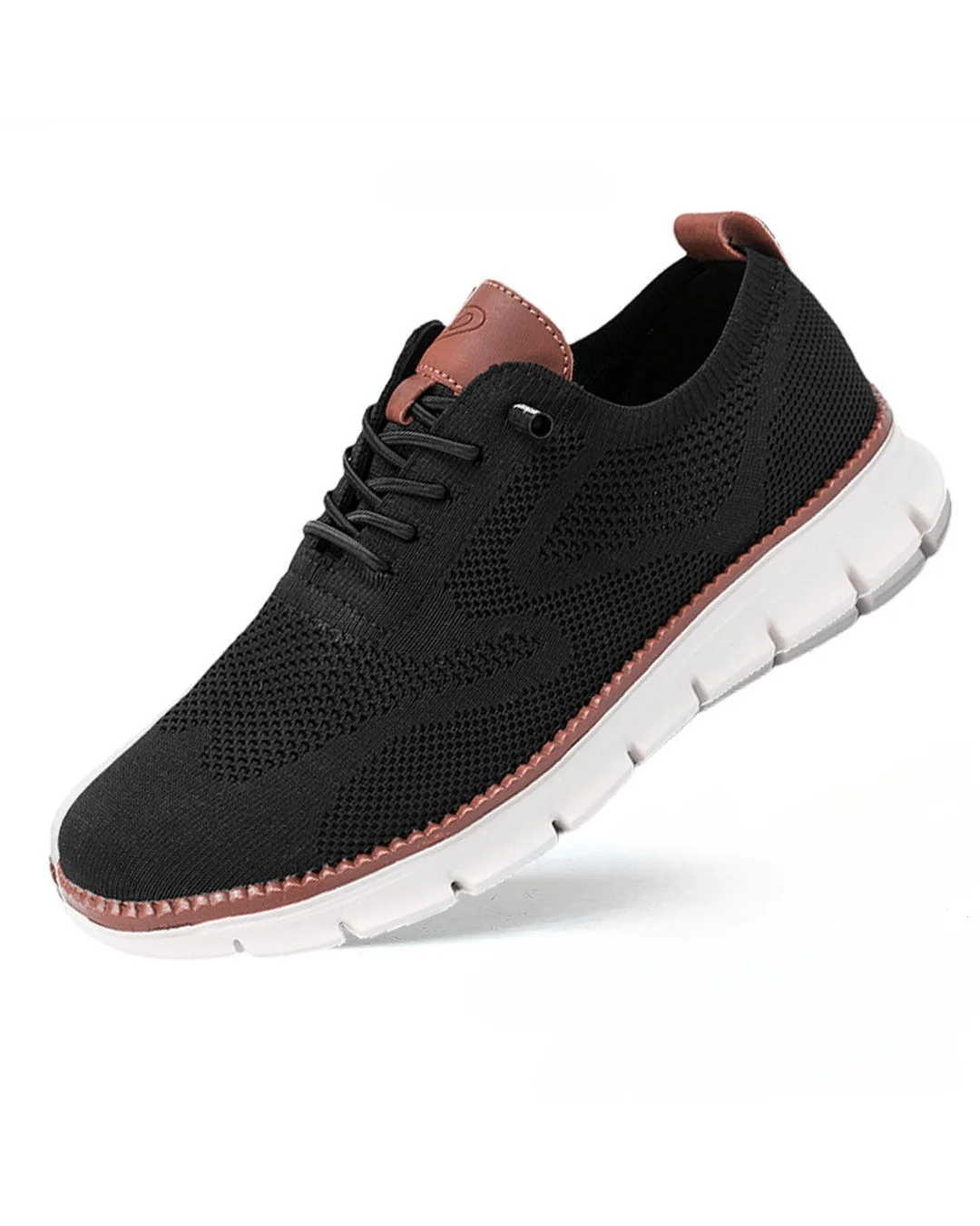 Side view of men's knit trainers showing textured mesh construction and flexible ridged outsole.