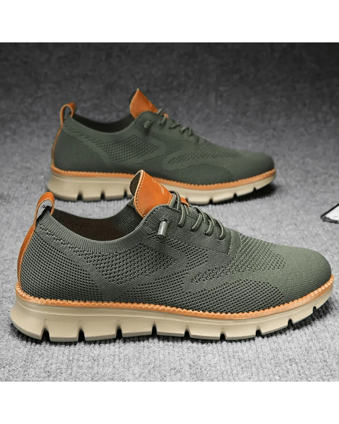 Men's knit trainers in blue colourway from side view with cushioned sole visible.