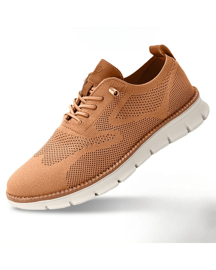 Rear view of men's knit trainers showing pull tab and contrast trim detail.