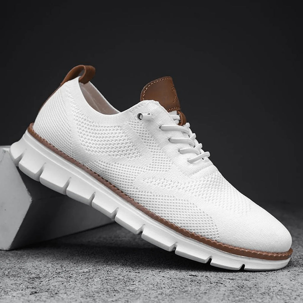 Men's knit trainers in white with clean mesh construction and lace-up closure.