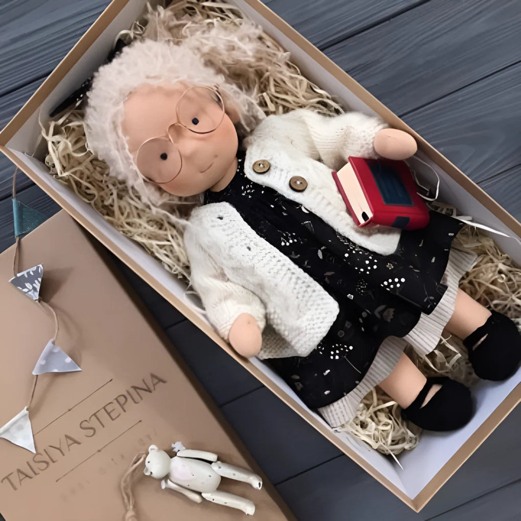 Handmade Waldorf cuddly doll with natural cotton body and pastel dress in gift box