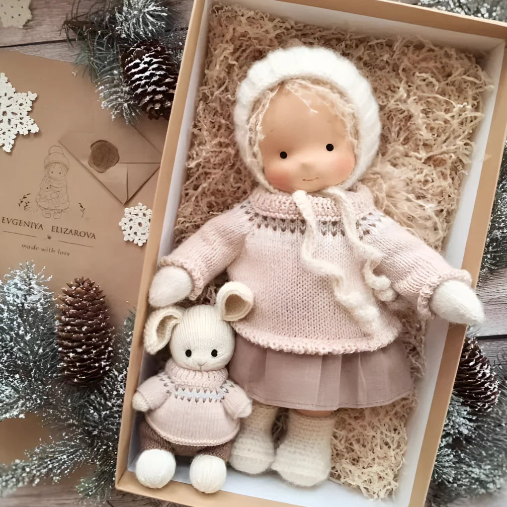 Waldorf cuddly doll featuring neutral facial expression and natural colour palette