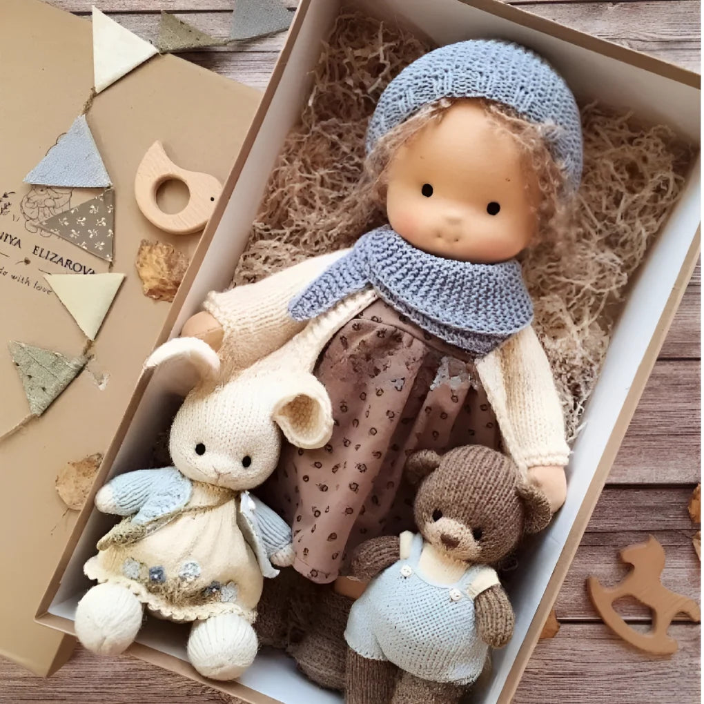 Natural cotton Waldorf cuddly doll in gift packaging with soft textures