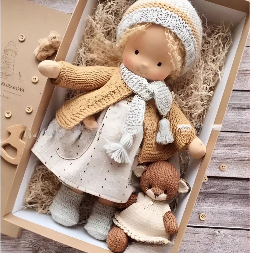 Handcrafted Waldorf cuddly doll with hypoallergenic materials and pastel dress