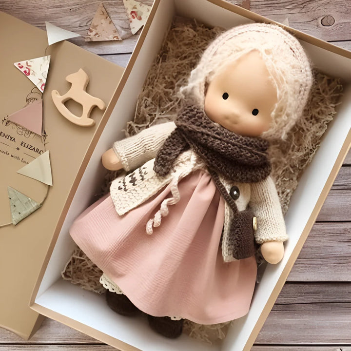 Waldorf cuddly doll featuring soft wool stuffing and ribbed knit sleeves