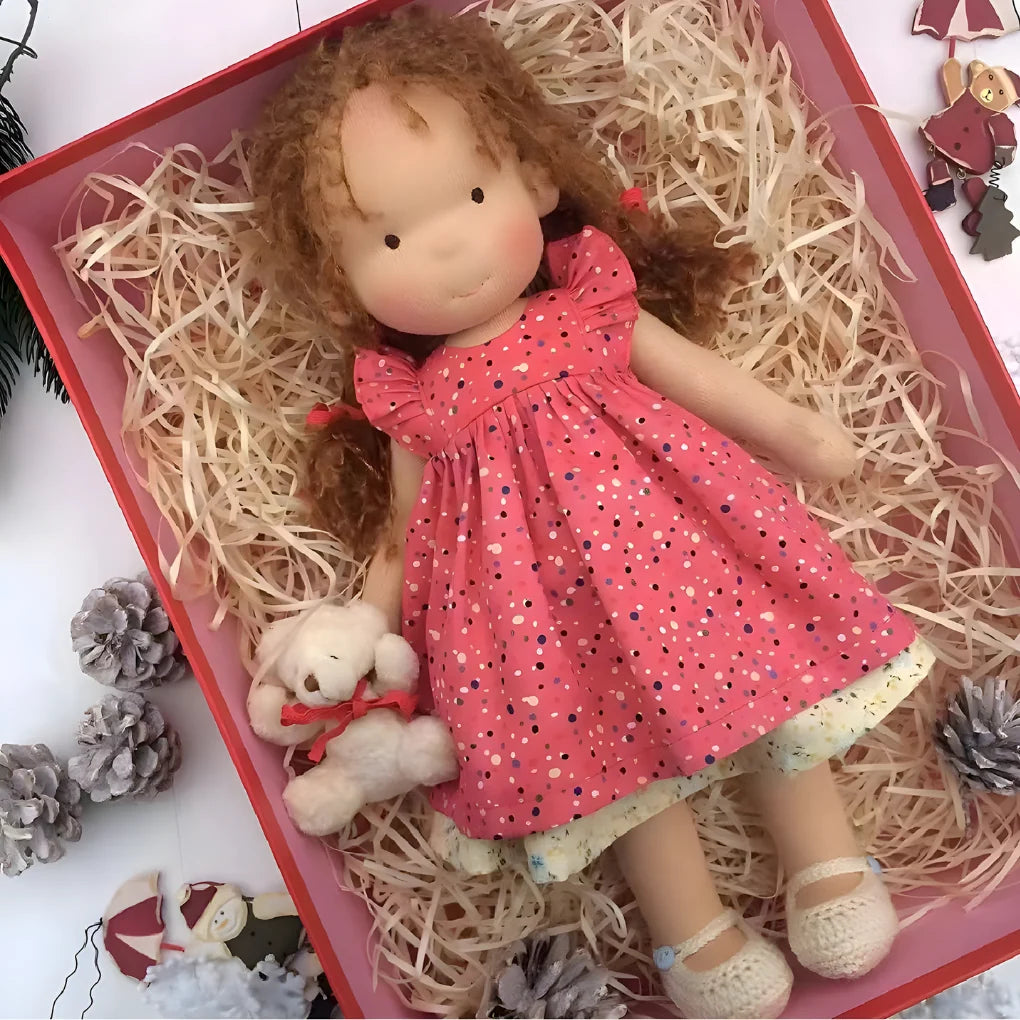 Waldorf cuddly doll in presentation box with cream cardigan and pastel clothing