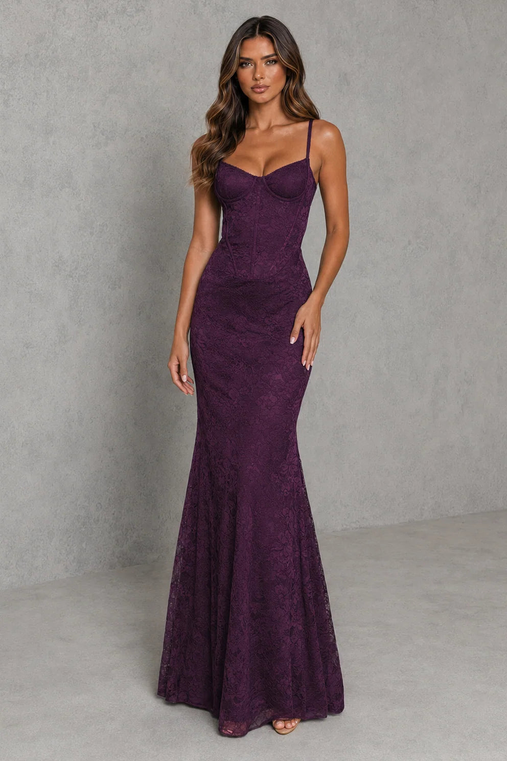 Lace sweetheart maxi dress in deep purple with corset bodice and flowing skirt for formal occasions