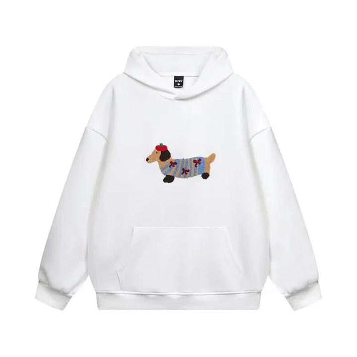 Side view of women's oversized pullover hoodie showing relaxed silhouette and ribbed cuffs