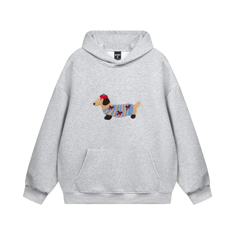 Detail of kangaroo pocket and ribbed hem on women's fleece pullover hoodie