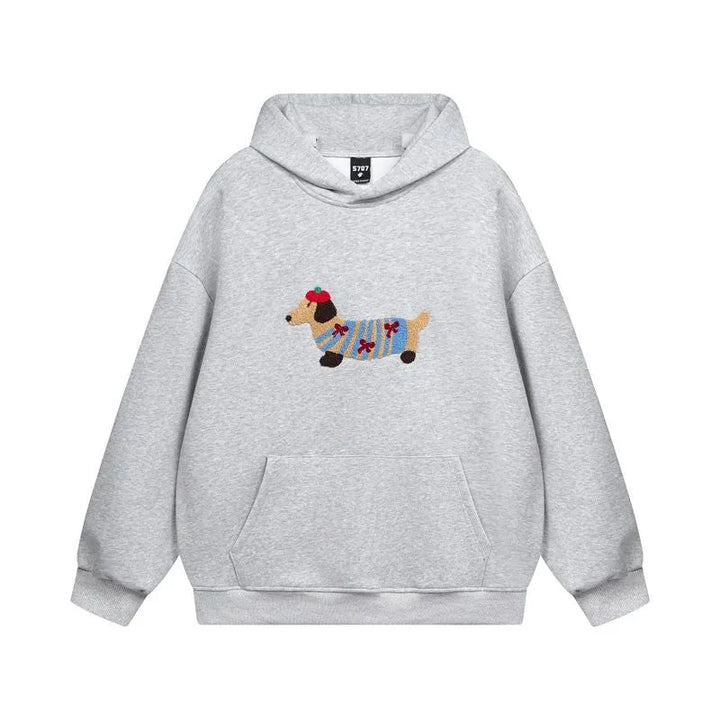 Detail of kangaroo pocket and ribbed hem on women's fleece pullover hoodie