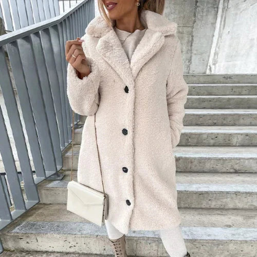 Close-up view of women's teddy coat showing soft textured fabric and relaxed fit silhouette