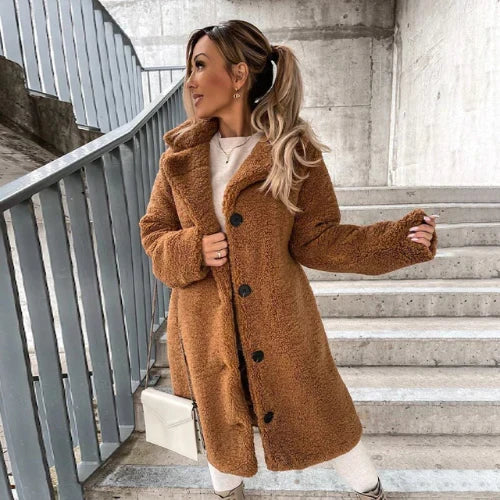 Full-length view of women's teddy coat in cream with classic notched lapel detail