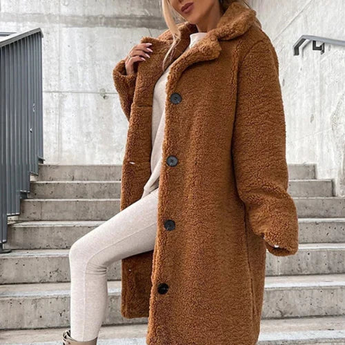 Women's teddy coat front view showing button fastening and cosy relaxed silhouette