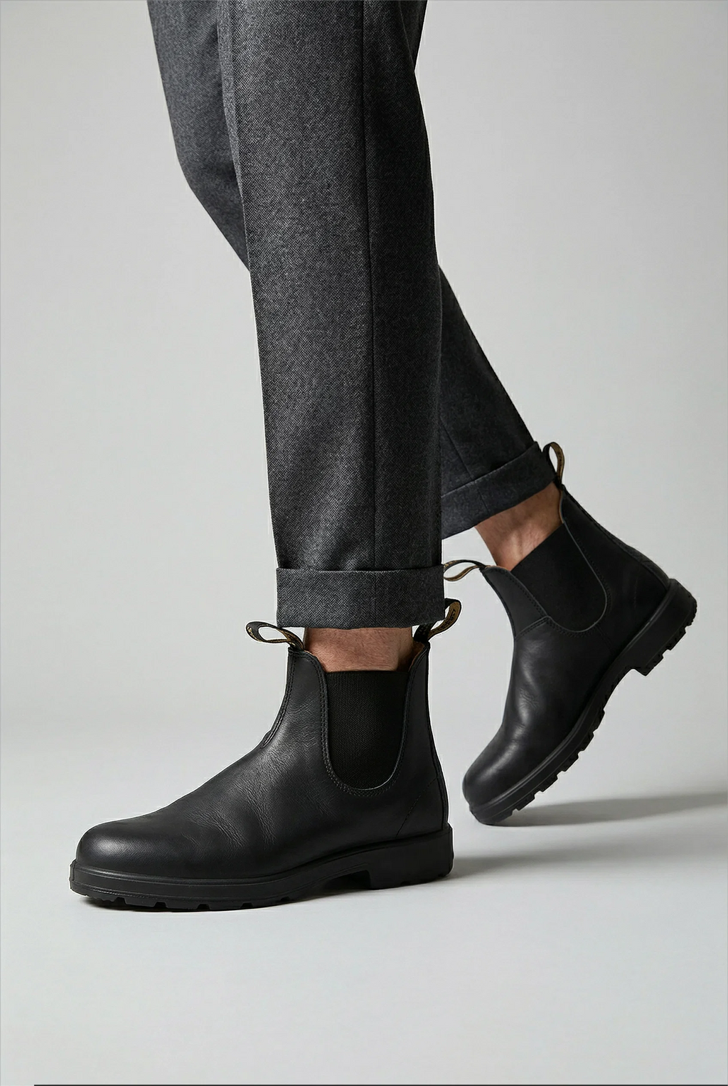 Side view of men's Chelsea boots showing elastic gusset and ankle height silhouette
