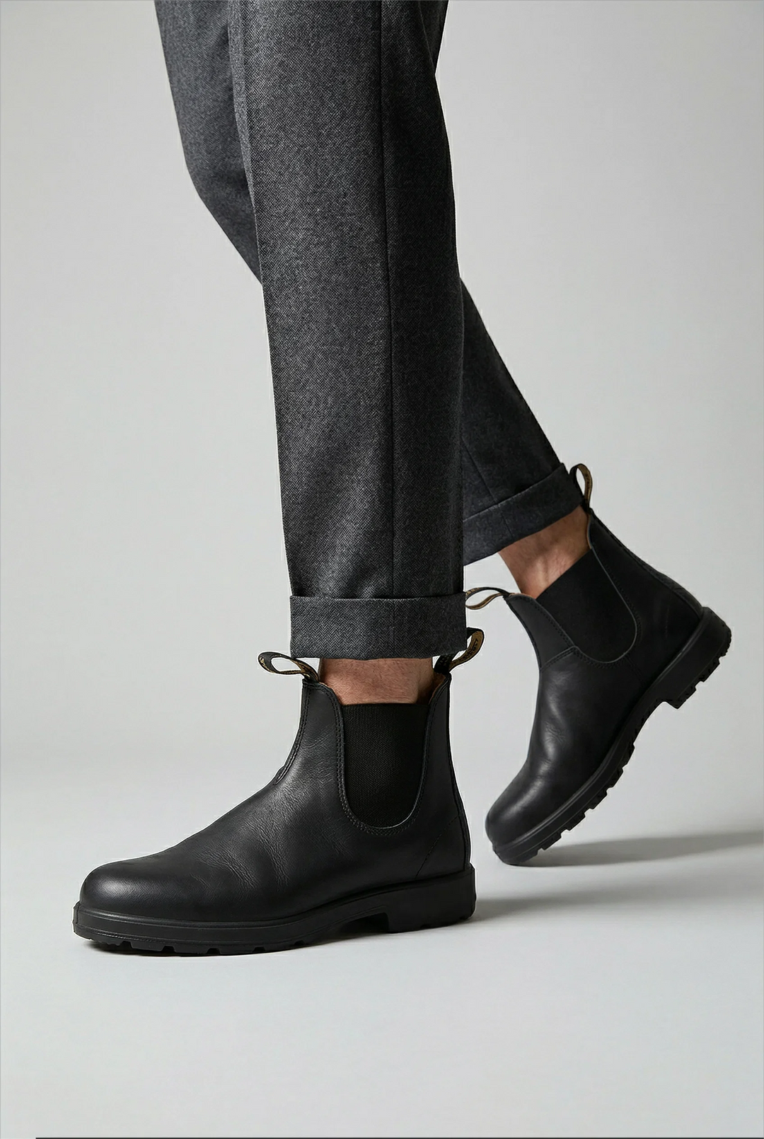Side view of men's Chelsea boots showing elastic gusset and ankle height silhouette