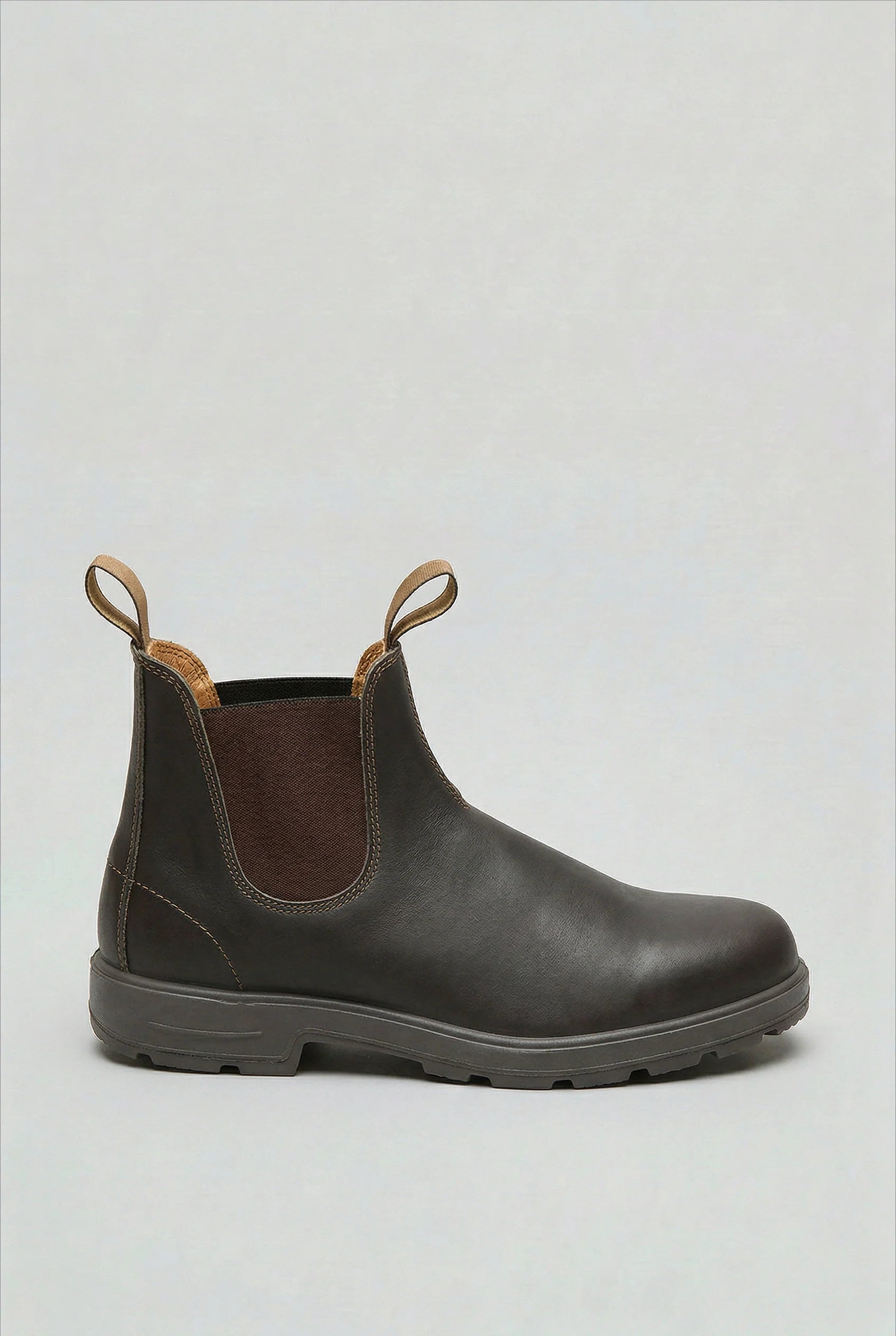 Front angle of men's Chelsea boots displaying rounded toe and clean lines