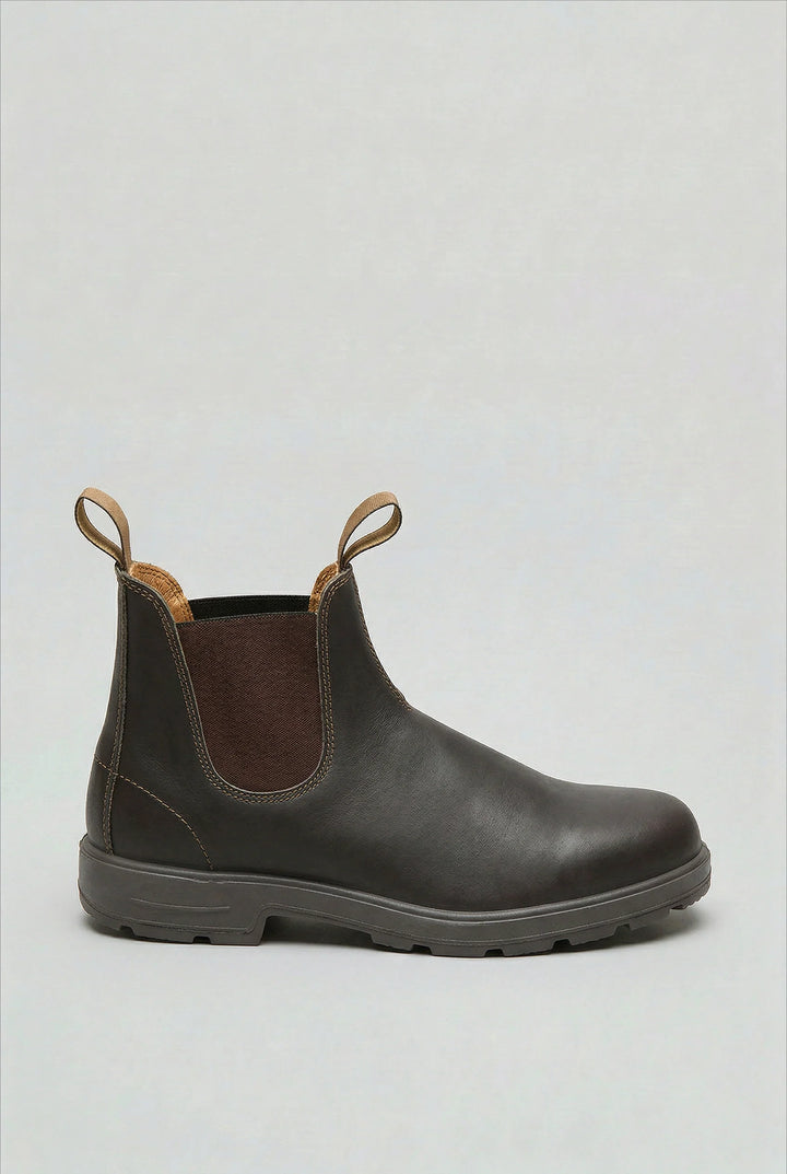 Front angle of men's Chelsea boots displaying rounded toe and clean lines
