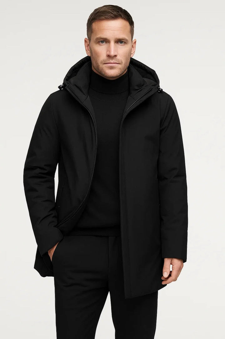 Men's hooded parka coat styled over black turtleneck jumper for smart-casual winter outfit
