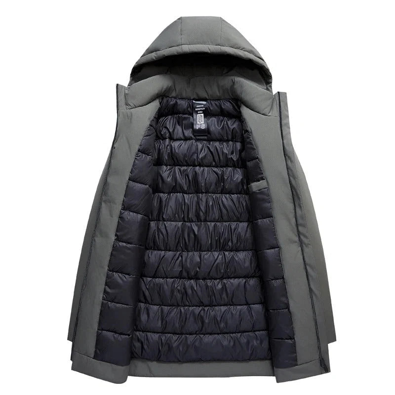 Detail of zip fastening and front pockets on men's hooded parka jacket