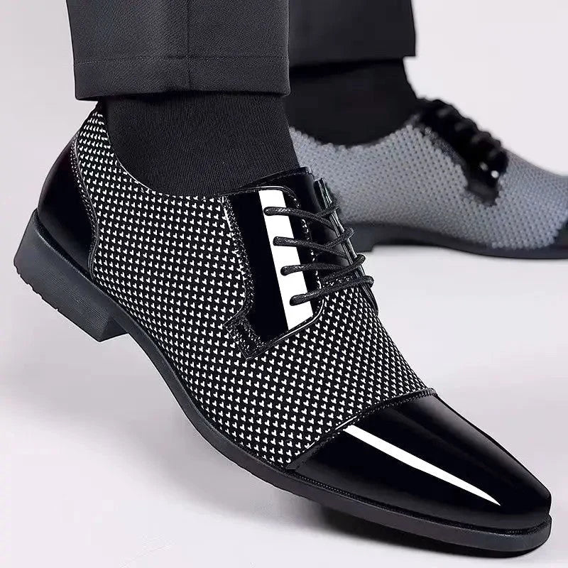 Men's dress shoes featuring cap toe design and contrast textured mesh panels