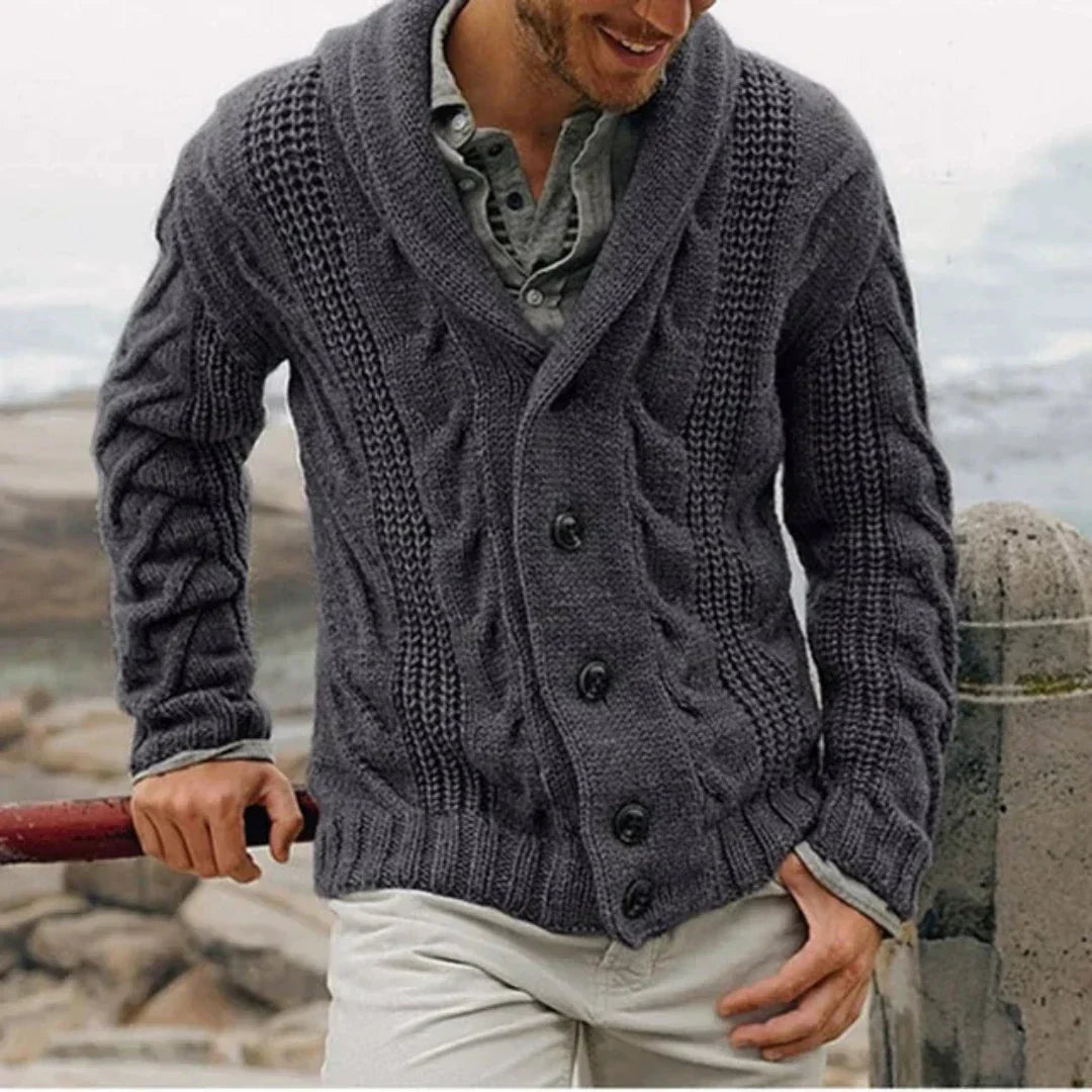 Side profile of men's navy shawl collar cardigan showing relaxed silhouette and knit pattern