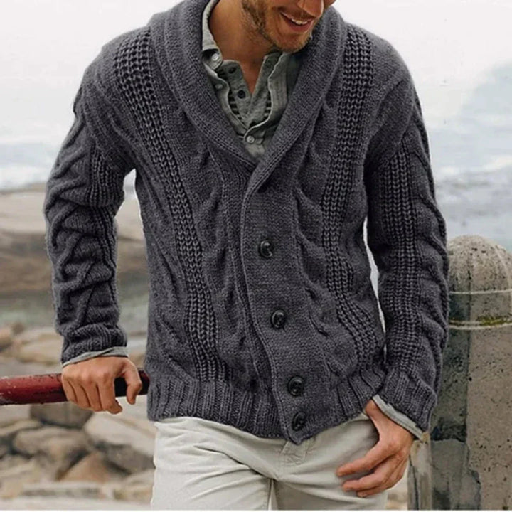 Side profile of men's navy shawl collar cardigan showing relaxed silhouette and knit pattern