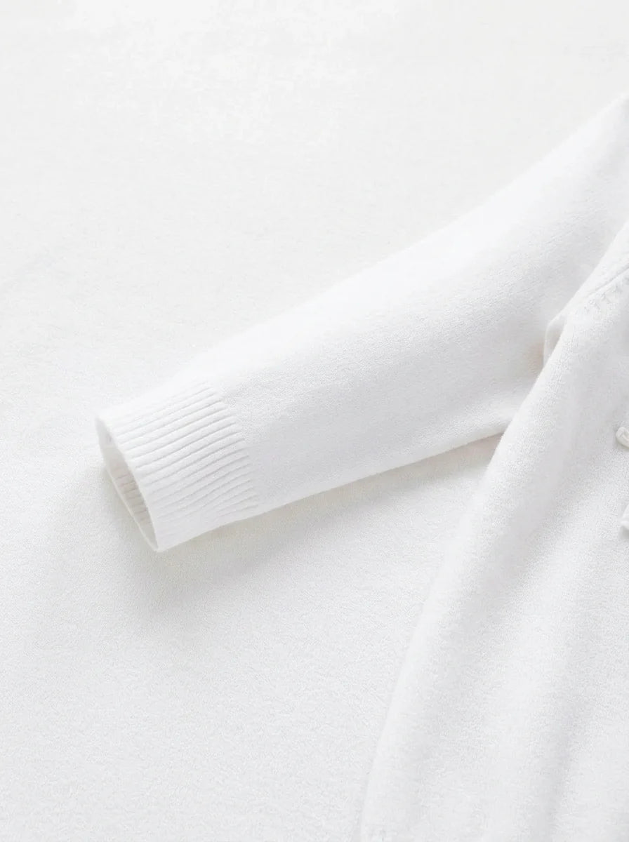 Men's half-zip jumper styled for weekend wear with relaxed trousers and casual look