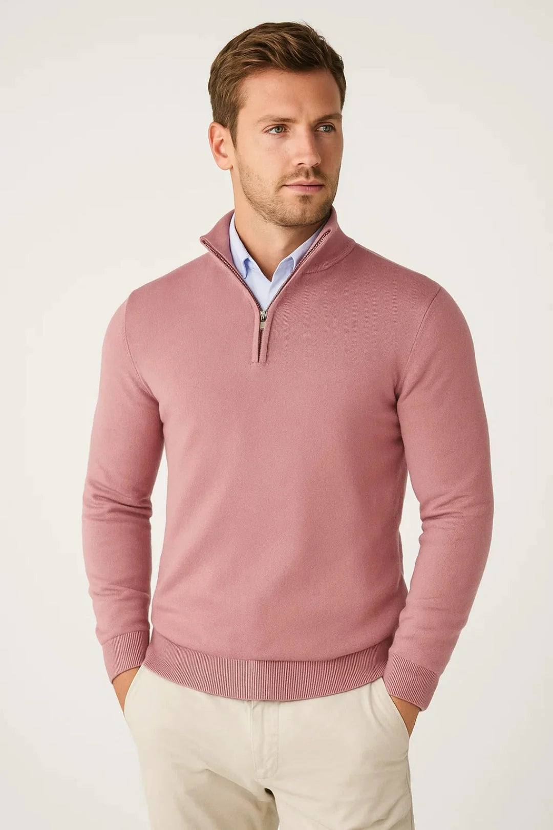 Men's half-zip jumper styled over collared shirt for smart-casual layering look