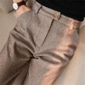 Men's herringbone pleated trousers in brown with classic tailored fit and button closure
