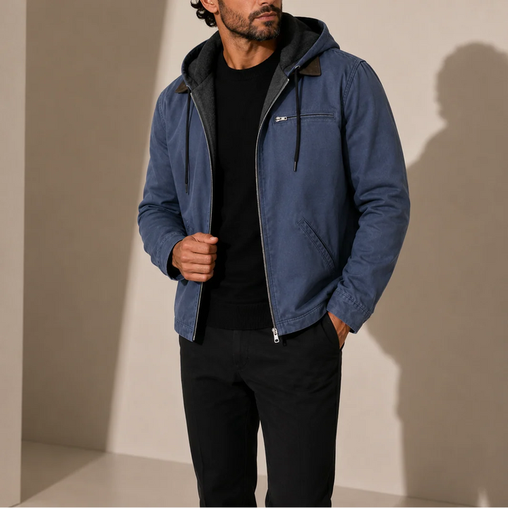Men's hooded jacket styled with black jumper and trousers for everyday casual autumn winter wear