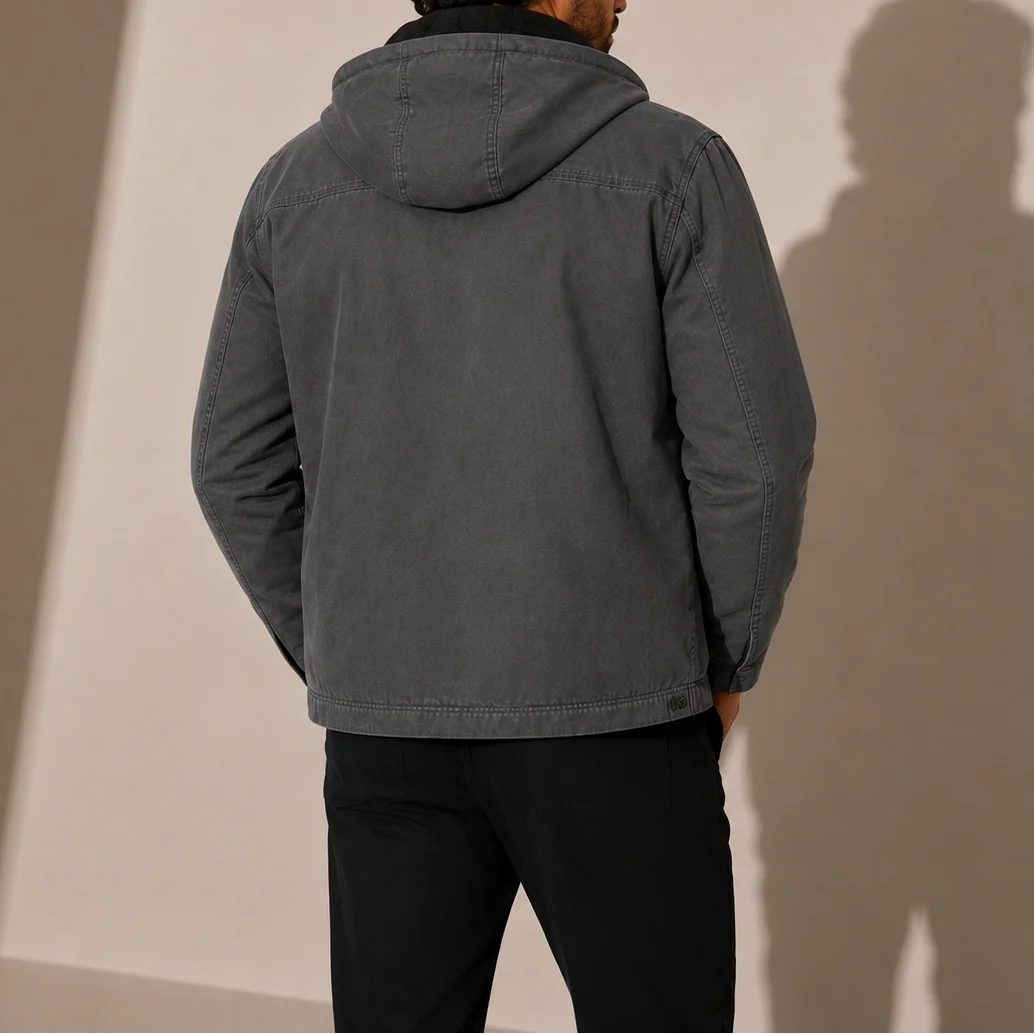 Detail shot of men's hooded jacket hood with adjustable drawstrings and soft fleece lining interior