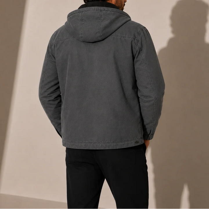 Detail shot of men's hooded jacket hood with adjustable drawstrings and soft fleece lining interior