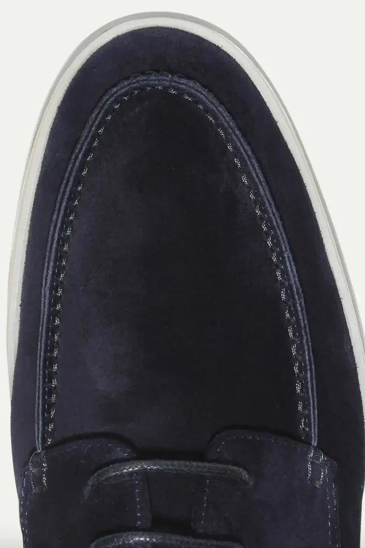 Men's navy loafers with lace-up closure and flexible sole for natural movement and everyday comfort