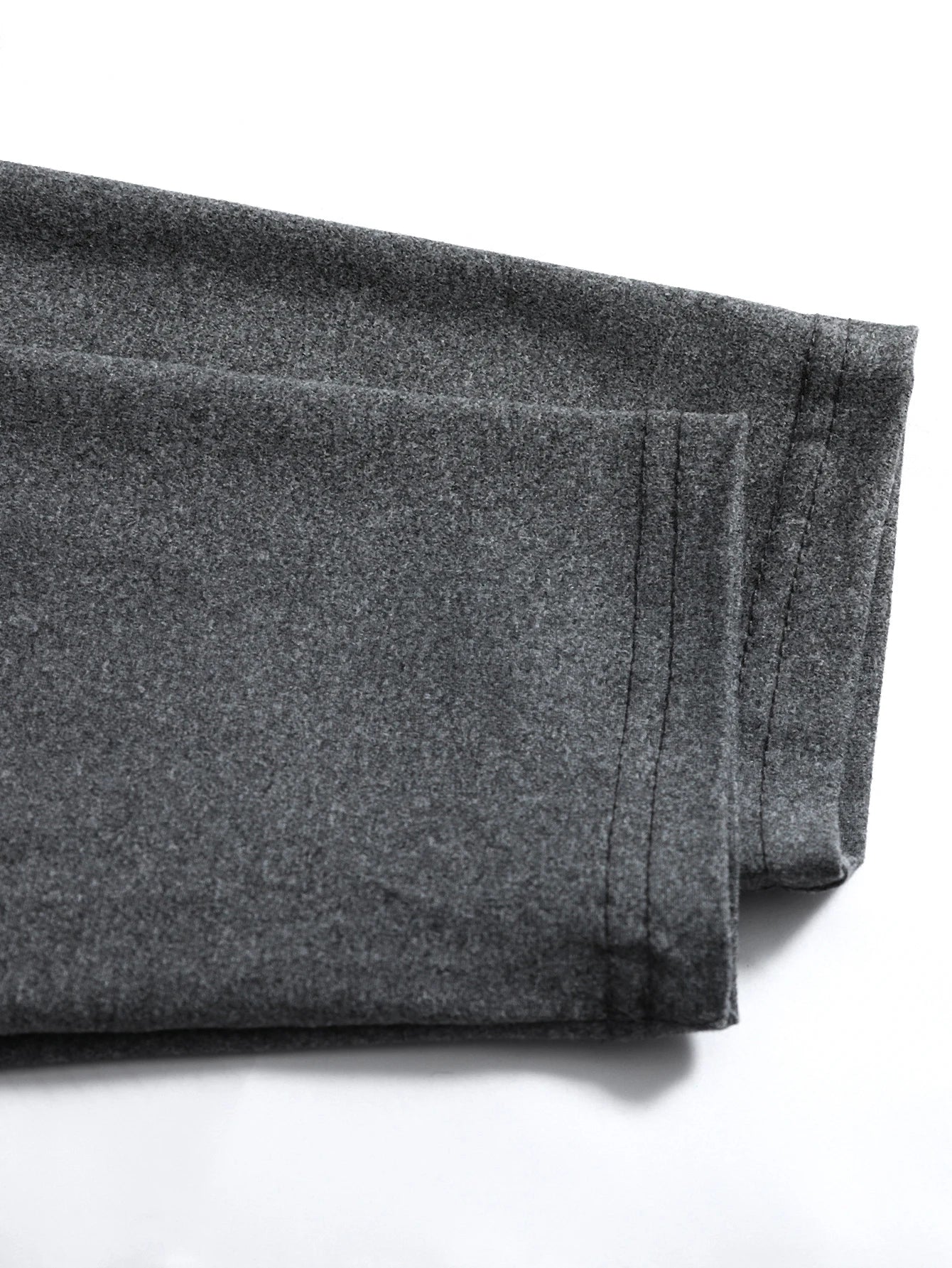 Men's v-neck long sleeve t-shirt styled with casual trousers for everyday wear