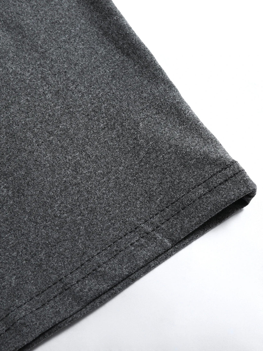 Detail shot of v-neckline on men's long sleeve t-shirt showing clean finish