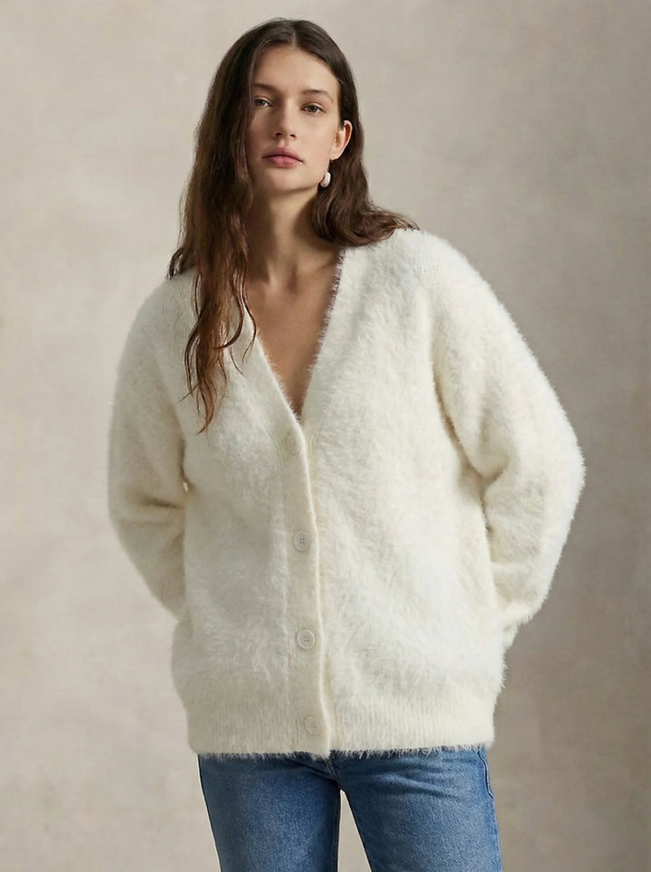 Back view of women's cashmere cardigan showing oversized dropped shoulder fit