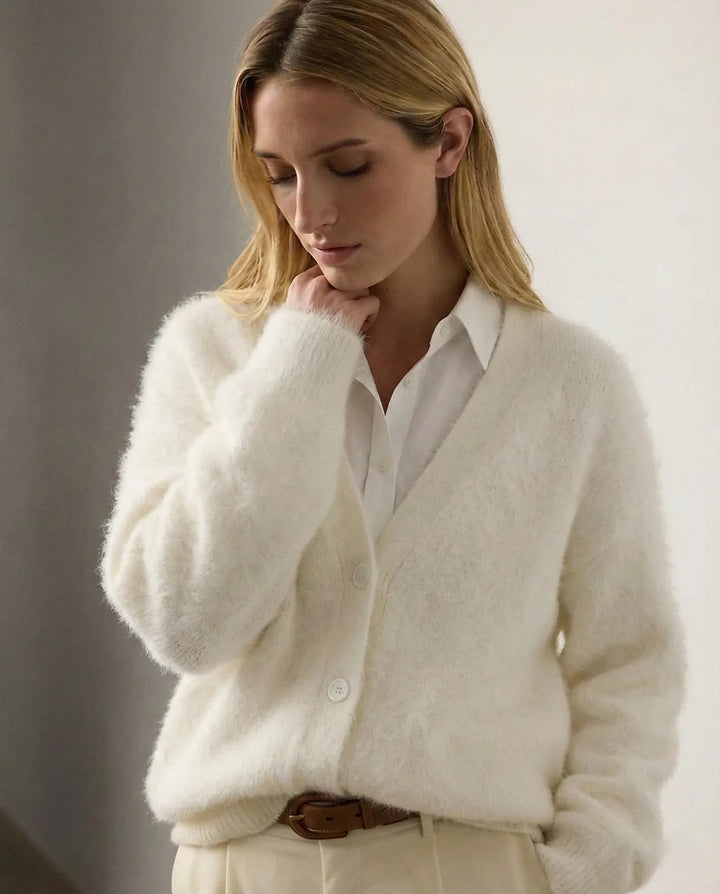 Close-up of soft fluffy texture on women's cashmere cardigan sleeve