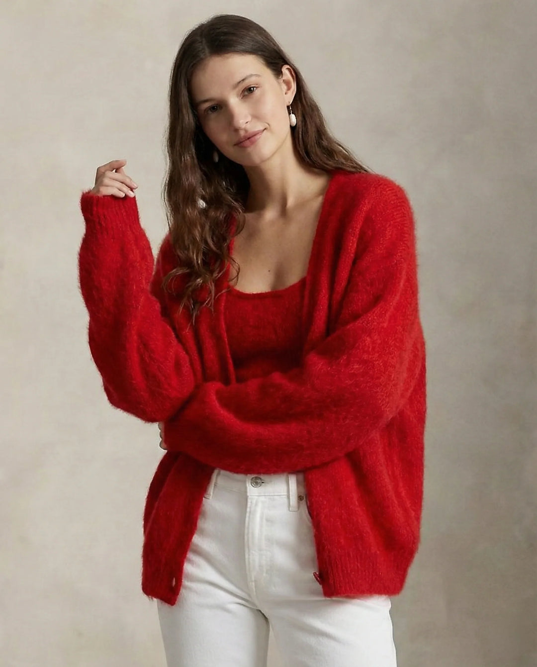 Full outfit view of cashmere cardigan paired with high-waist trousers