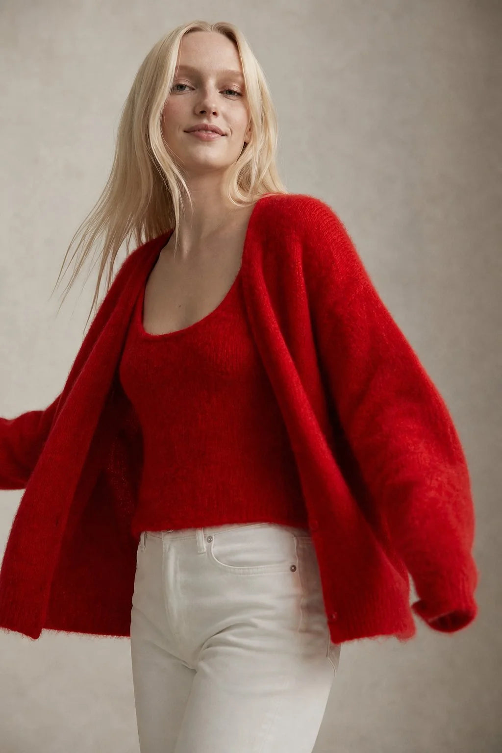 Close-up of ribbed cuffs and hem detail on fluffy cashmere cardigan
