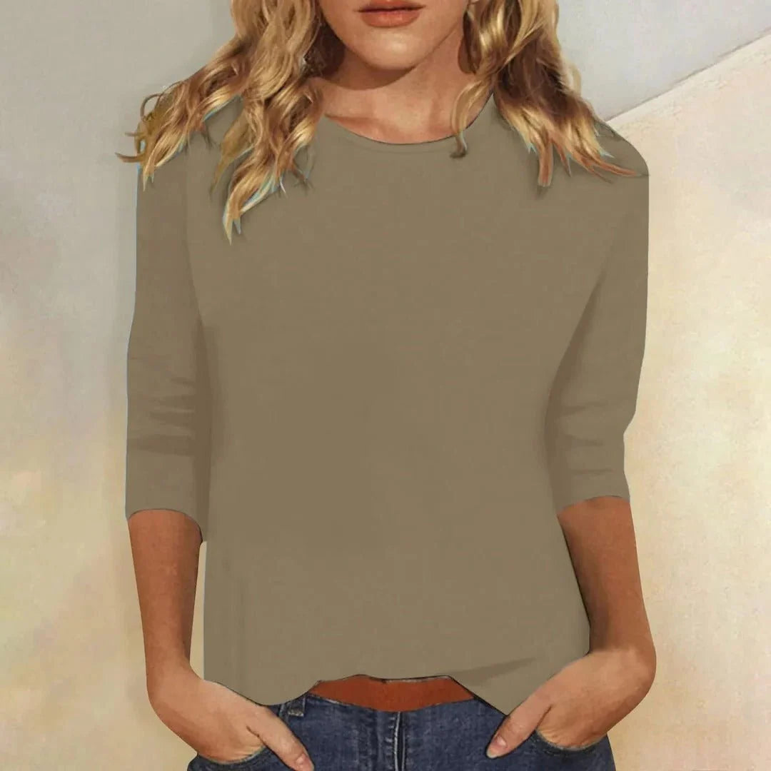Women's crew neck top in casual styling showing versatile everyday silhouette