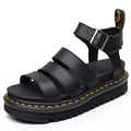 Women's platform sandals with chunky sole, multi-strap design, and adjustable ankle buckle in structured finish