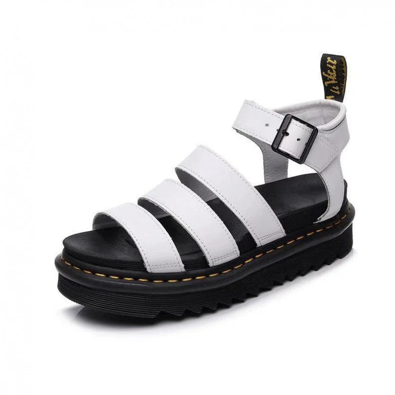 Side view of women's platform sandals showing thick sole with contrast yellow stitching and tread detail