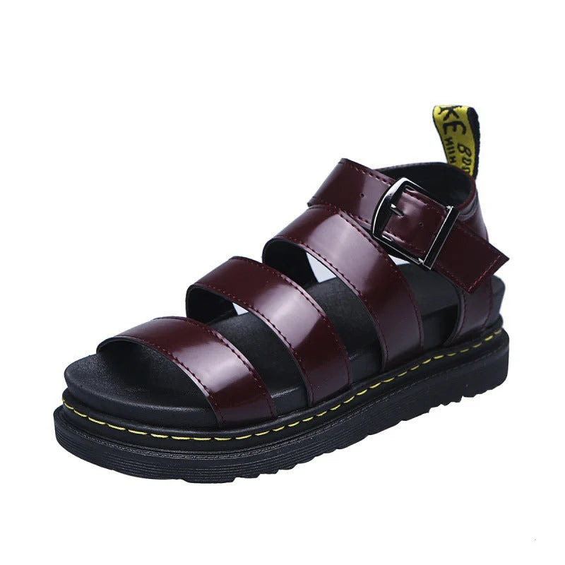Close-up of adjustable ankle strap with metal buckle on women's platform sandals