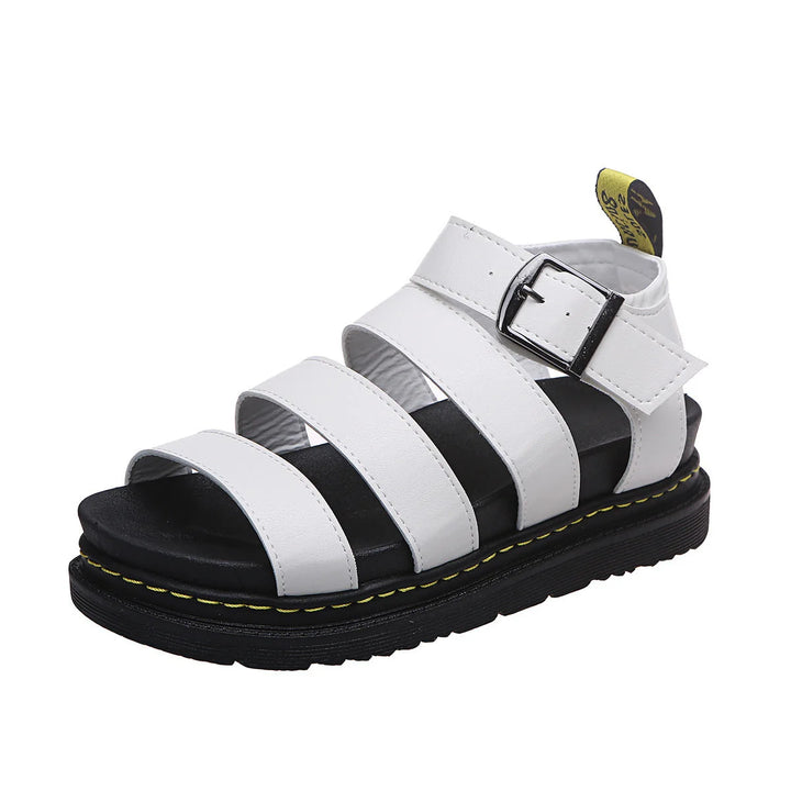 Detail shot of contrast stitching and tread pattern on women's platform sandal sole
