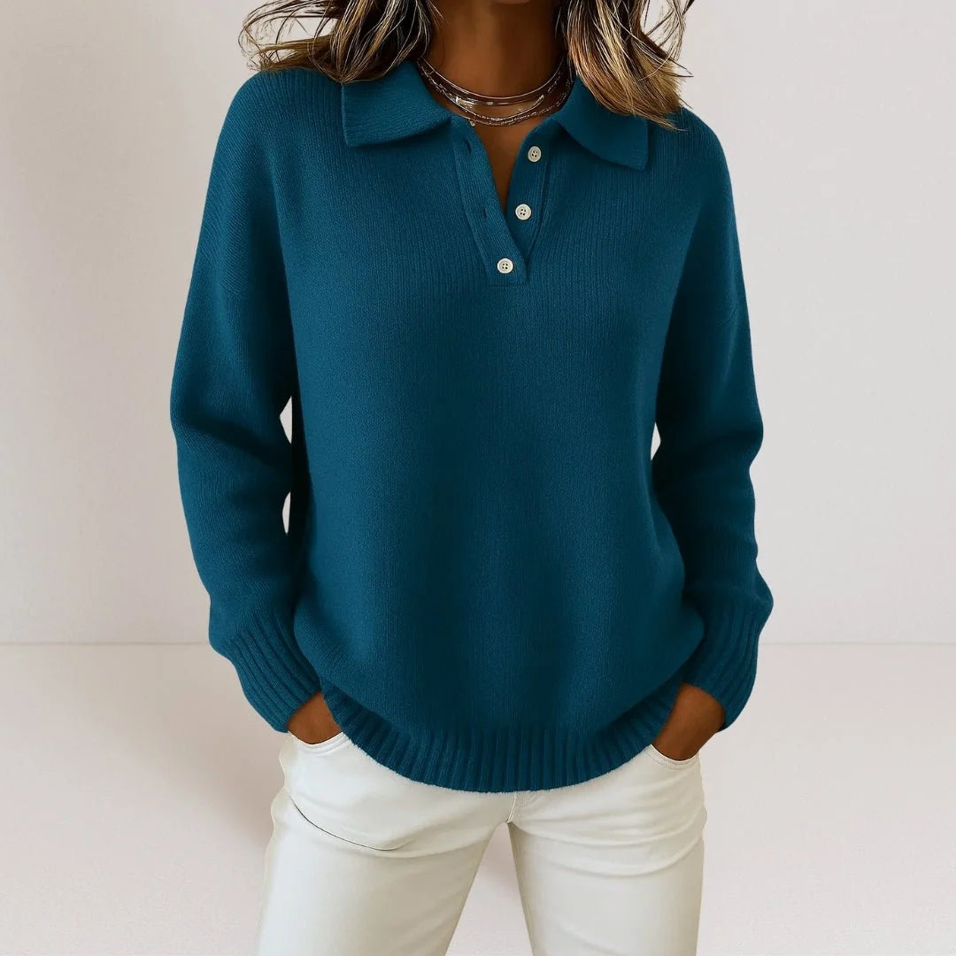 Close-up of polo collar and button placket detail on women's knit jumper