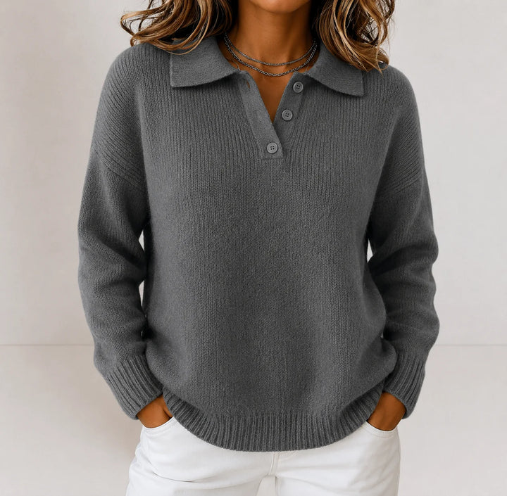 Women's polo jumper in light blue showing soft drape and comfortable fit