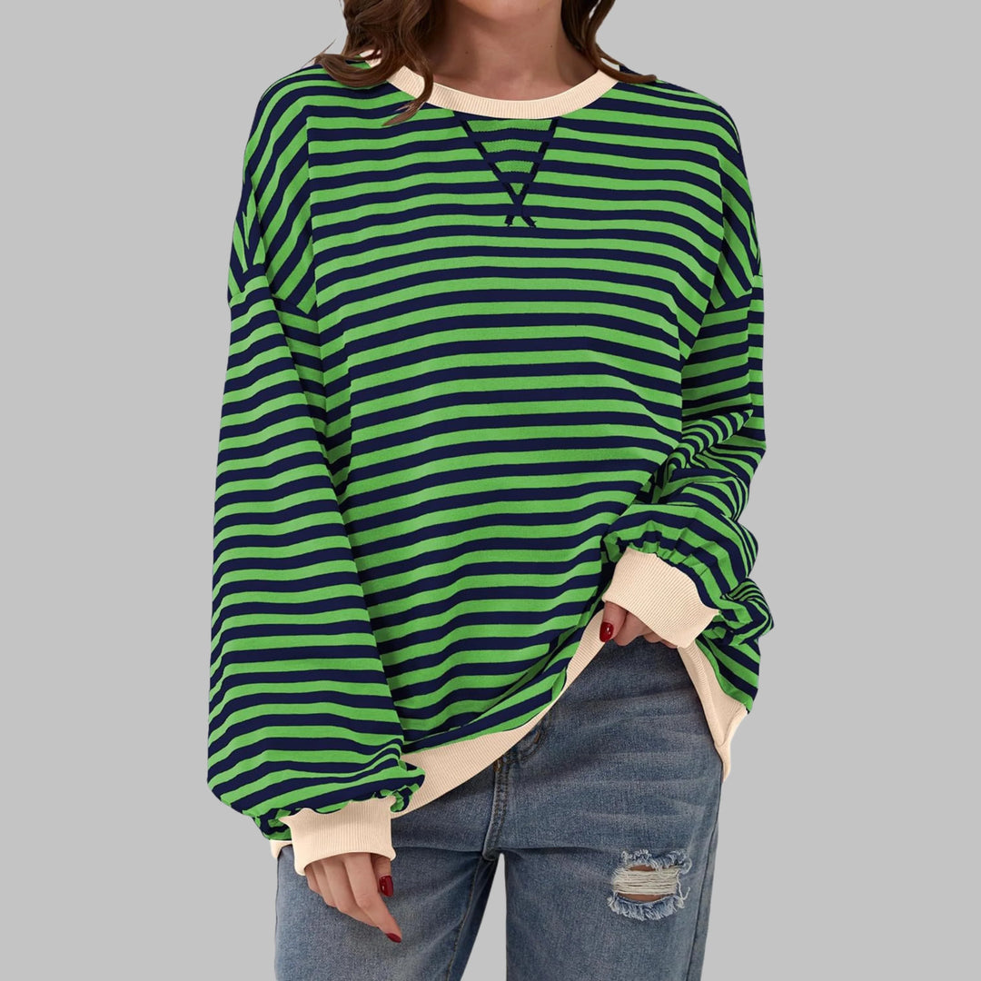 Women's oversized striped jumper in green and navy with contrasting cream ribbed neckline and cuffs